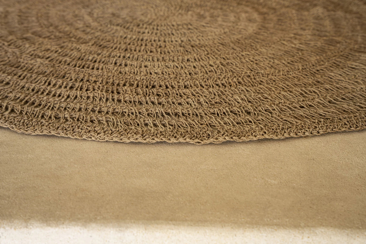 Tapis rond en fibres naturelles