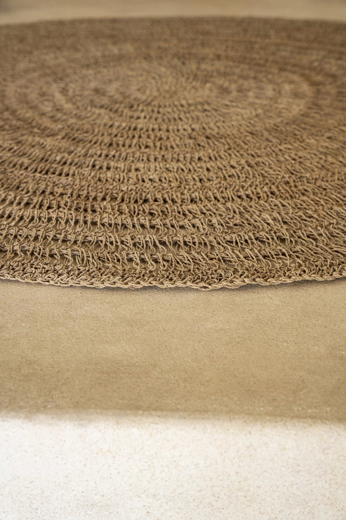 Tapis rond en fibres naturelles