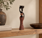 Statuette femme porteuse en ébène